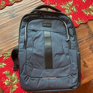 Lovevook brand new blue backpack with USB. Three main pockets.
